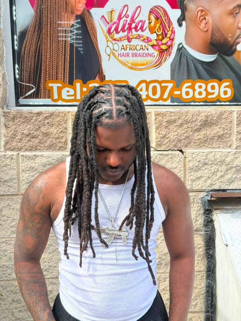 Sharp cornrow design styled at Difa